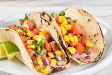 fresh tacos with beans and corn