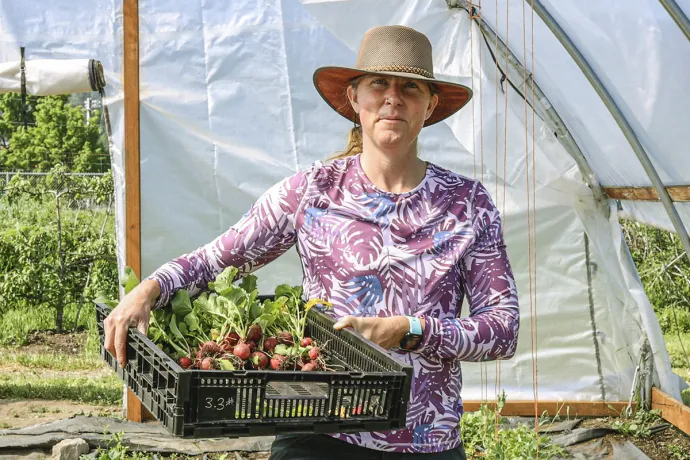 farmer holding fresh produce